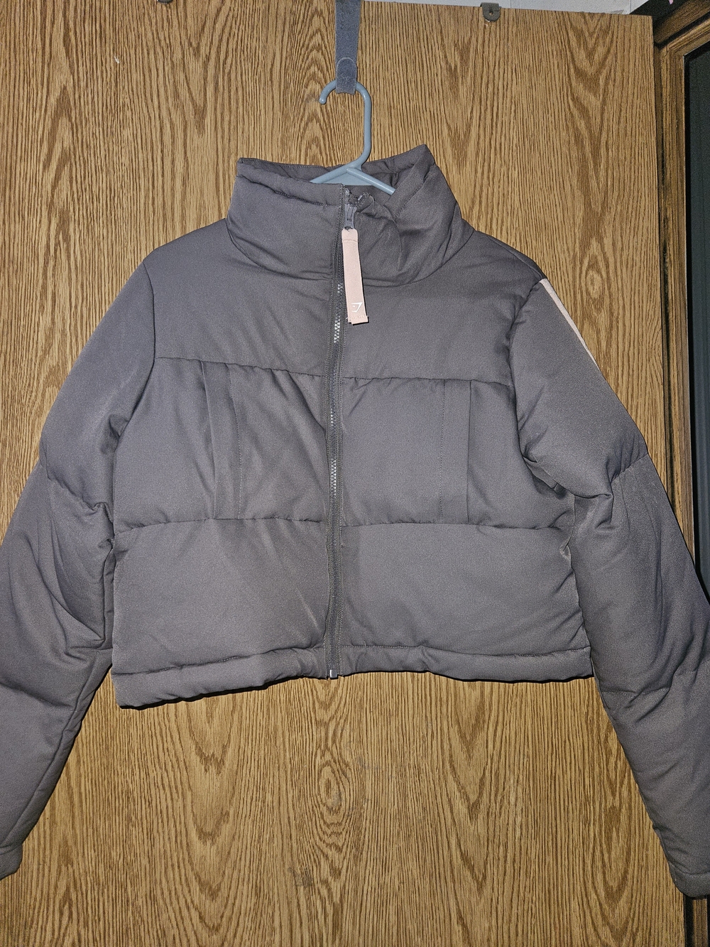 Gymshark Gray Cropped Puffer Jacket with Pink Accent